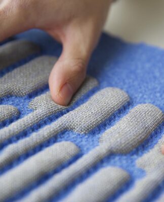 Researchers at MIT Media Lab develop KnittedKeyboard II KnittedKeyboard II being played. © Irmandy Wicaksono