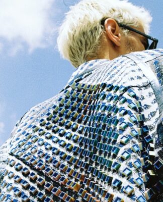 The Illusion jacquard coat features a four-color 3D effect created by designers Vittorio Branchizio and Uroš Mihić in collaboration with Maglificio MAS. © The Woolmark Company