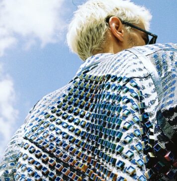 The Illusion jacquard coat features a four-color 3D effect created by designers Vittorio Branchizio and Uroš Mihić in collaboration with Maglificio MAS. © The Woolmark Company